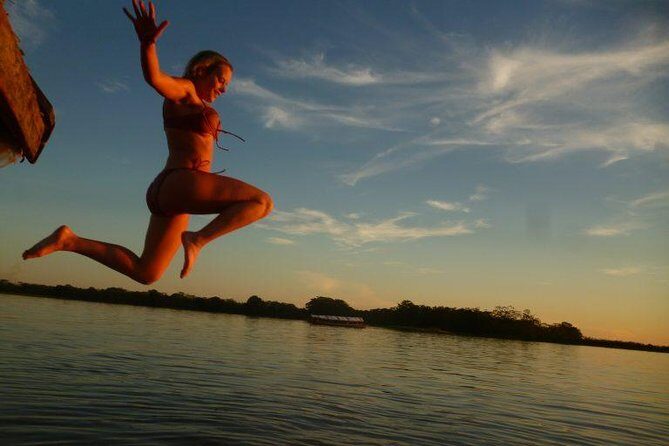 2-Day All Inclusive Guided Jungle Tour from Iquitos at Maniti Eco-Lodge - Day One in Iquitos: Market Morning, Dolphin Afternoon, Night Hike