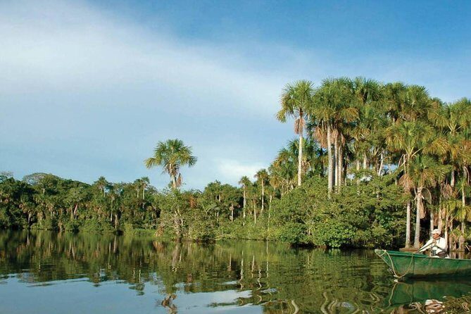 4 Day Tambopata Amazon Wildlife & Canopy Experience - Day 1 by Madre de Dios: Monkey Island and caiman eyes after dark