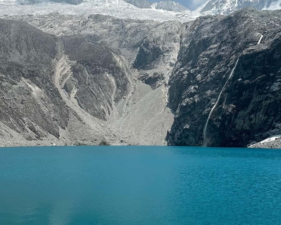 From Huaraz: Hike to the Lagoon 69 - Lagoon 69 at 15,255 Feet: Blue Water and Snow-Capped Reflections