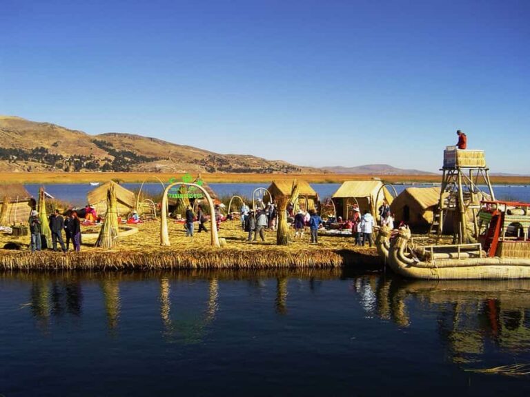From Puno: Floating Islands of the Uros Half-Day Tour - Entering the Uros Floating Islands: Totora as the Main Building Material