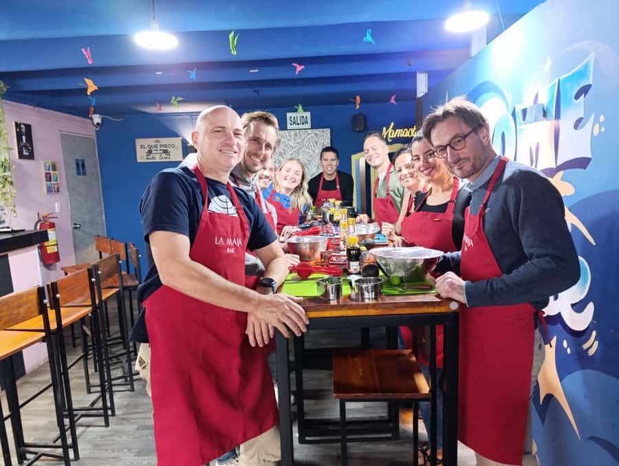 Miraflores: Amazing Peruvian Cooking Class Ceviche Seafood and Pisco Sour - Inside the Room: Art, a Peru Intro Video, and a Taste-First Pace
