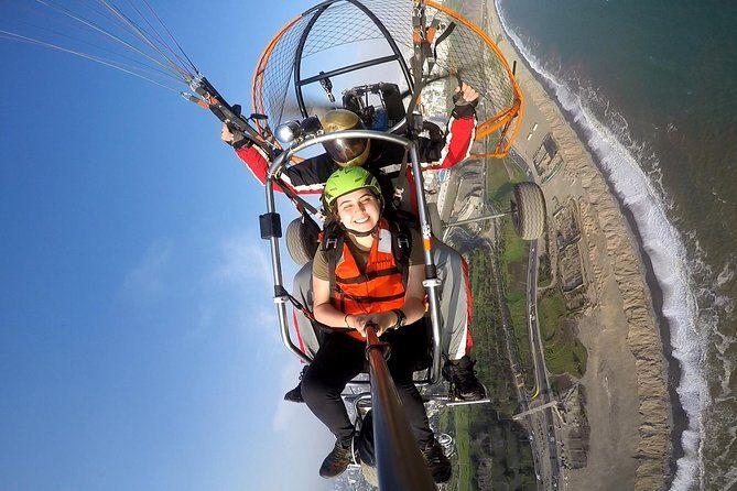 Paragliding in Lima - Costa Verde - The pre-flight routine: helmet, instructor briefing, and the waiting game