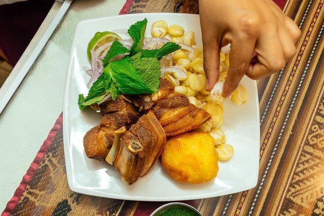 The 10 Tastings of Cusco With Locals: Private Food Tour - Another Qorikancha stop: fried pork on a baguette with onion and mint